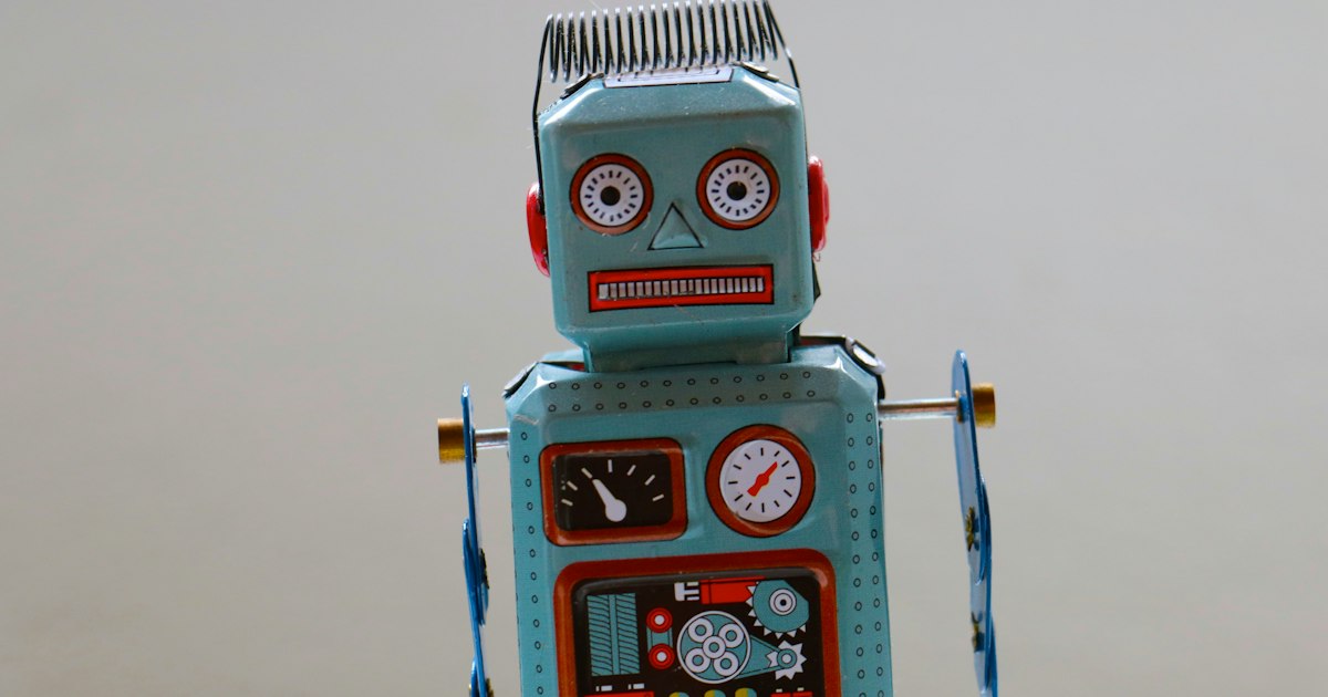 Robot de juguete antiguo de hojalata
